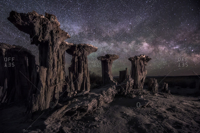 Sand tufas are illuminated in California\'s famous Mono Lake area as the Milky Way dances above