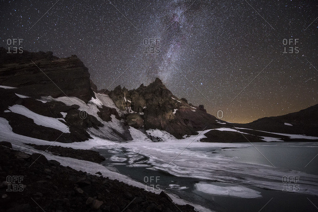 The Milky Way Galaxy moves across a clear night sky from No Name Lake taken in the Three Sisters Wilderness