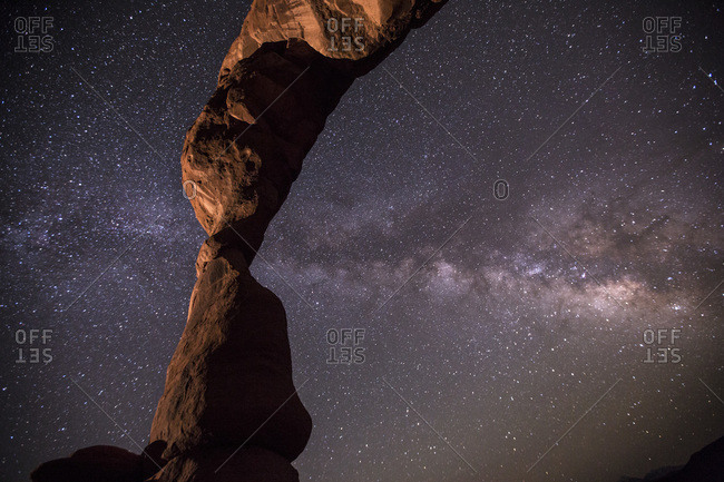 The Milky Way pierces Utah\'s famous Delicate Arch in Arches National Park