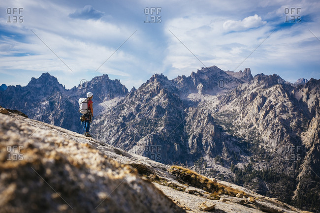 A woman enjoying the view on the top of the Elephants Perch, Sawtooth Mountains, ID