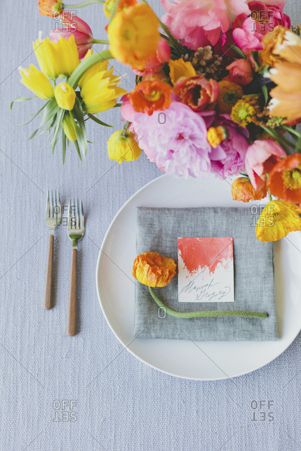 Floral table setting with a card