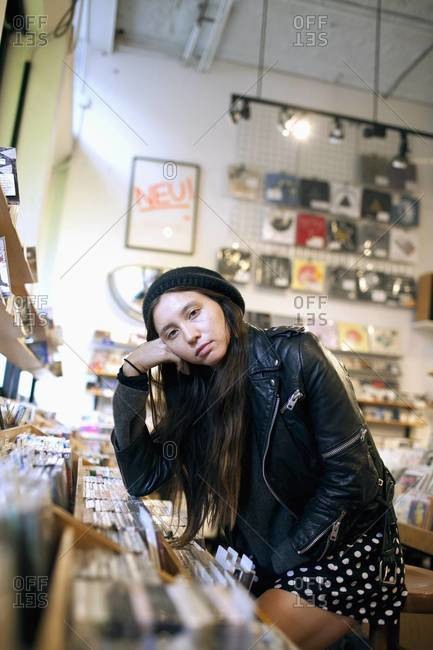 Portrait of woman in record store
