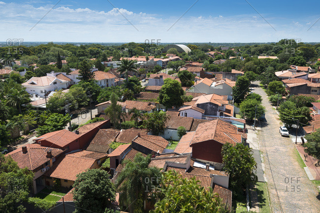 Aerial view of traditional Spanish tiles on rooftops of houses in a residential neighborhood, Asuncion, Paraguay