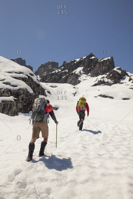 Two climbers approach Trio Peak in British Columbia, Canada
