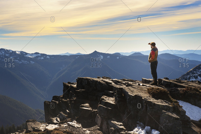 Man looking over mountains in Mount Rainier National Park, Washington