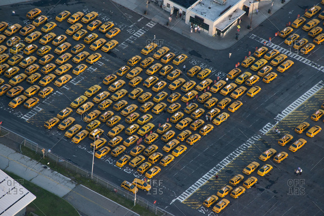 Cabs in a parking lot at John F. Kennedy International Airport in New York City, USA