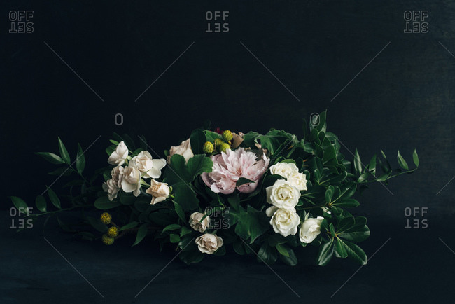 Floral arrangement with roses and peonies