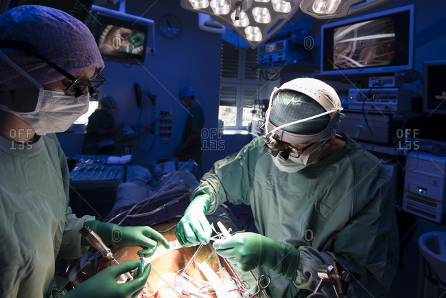 Two surgeons during a heart surgery