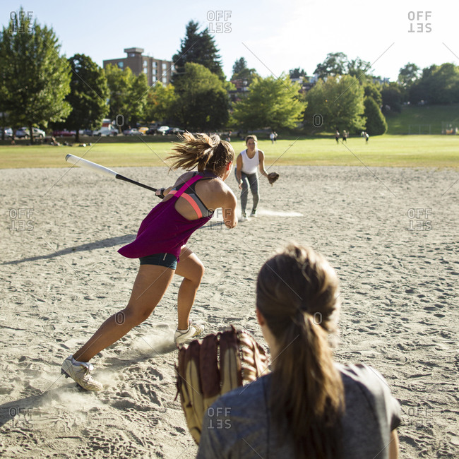 Women playing softball in a Vancouver, Canada park