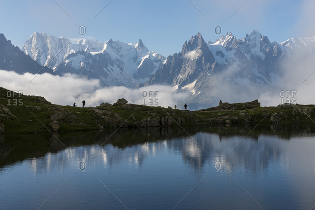 Hikers on the lake, Mont Blanc