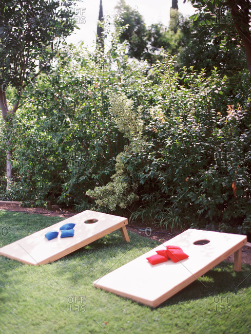 A lawn game in a back yard