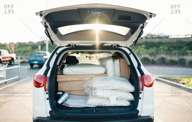 A trunk filled with newly purchased home goods