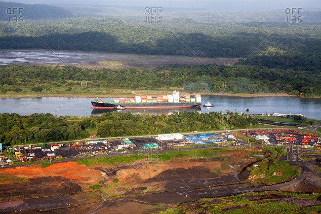 Cargo barge on river by port area