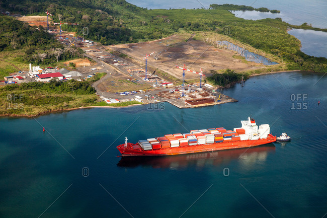 Cargo barge near small remote port