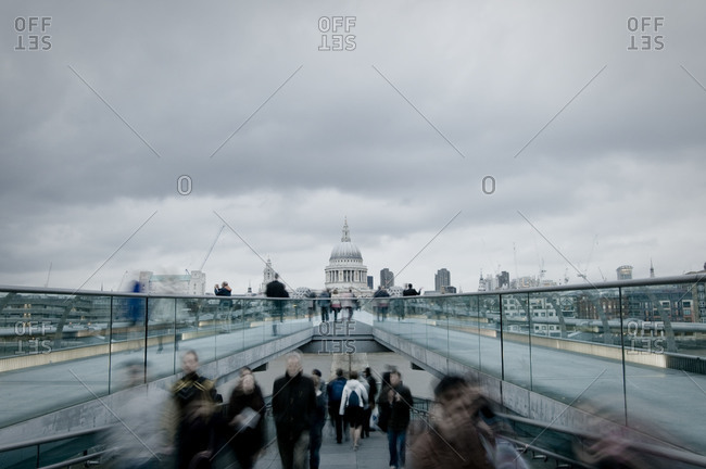 Millennium bridge over the Thames looking towards St Pauls Cathedral in London, England