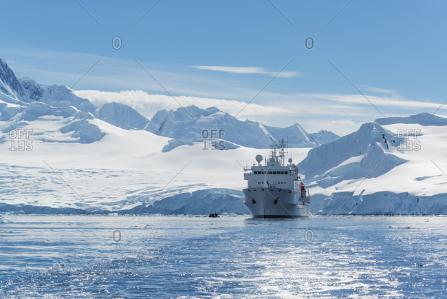View of a polar research vessel in the Antarctic ocean