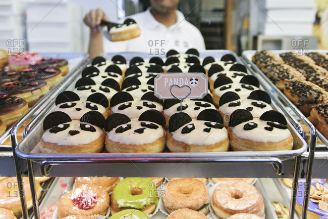 Panda-shaped donuts in a bakery