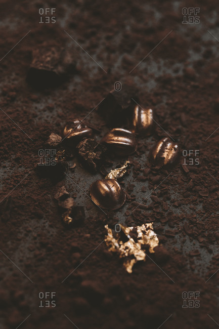 Edible confection on chocolate scattered surface