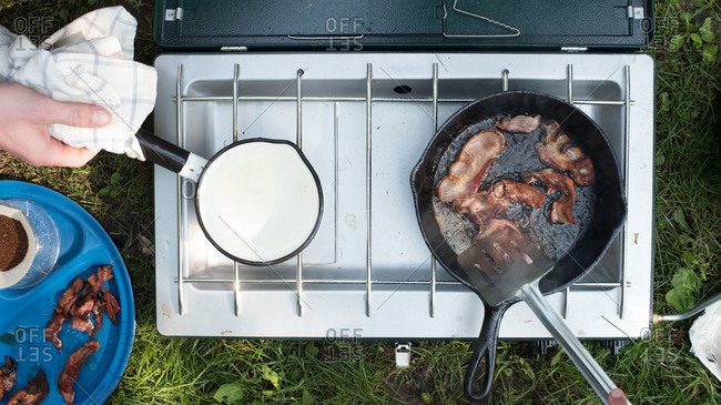 Cooking breakfast on a camp stove