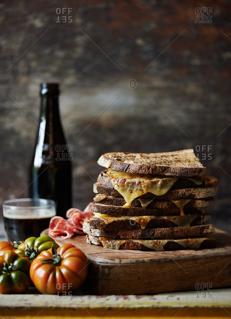 A grilled cheese sandwich with Sicilian tomatoes and root beer