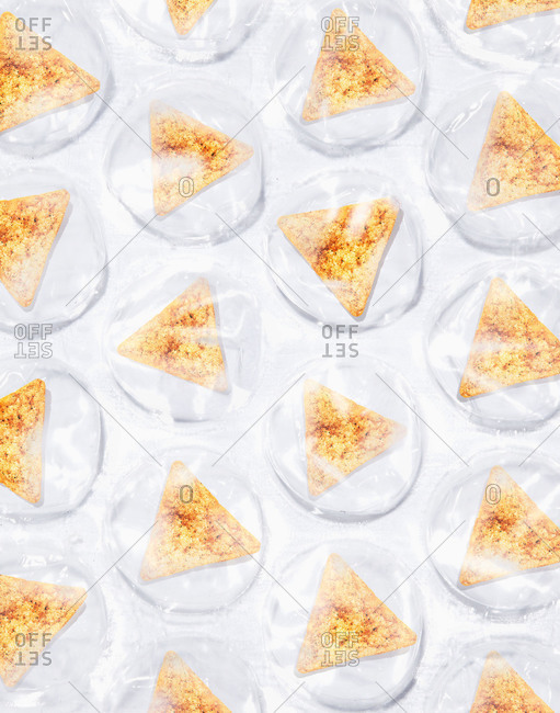 Tortilla chips sealed in plastic bubbles