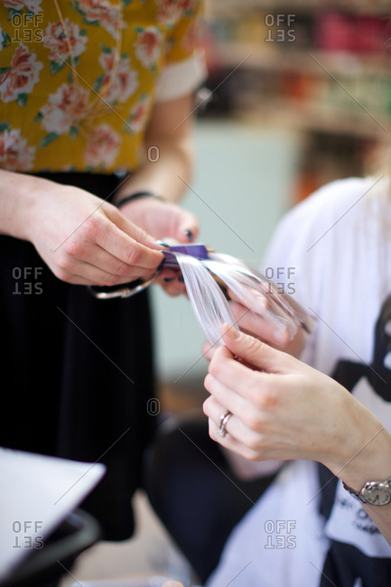 Female customer selecting hair samples
