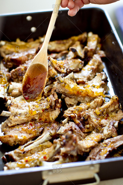 Glazed pork ribs in a roasting pan