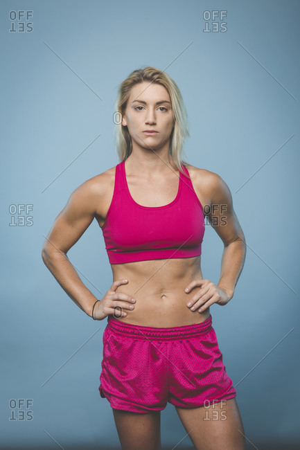 Physically fit woman in work out clothes