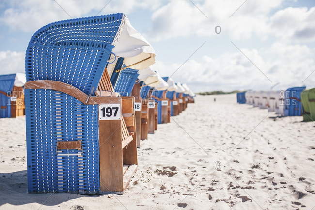 Hooded beach chairs on the beach, Warnemuende