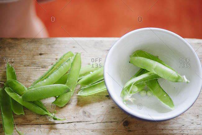 Snow pea shells in a bowl