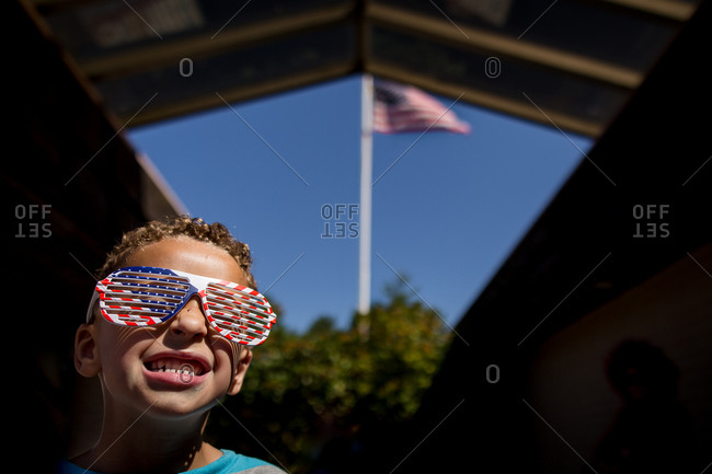 Boy in patriotic shutter shades