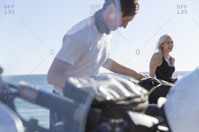 Young couple on a motorcycle trip