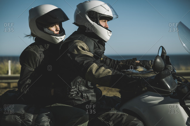 Couple riding on a motorcycle