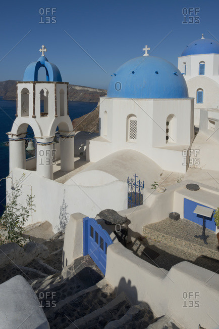 Blue domed churches overlooking the caldera, Oia, Santorini, Cyclades, Greek Islands, Greece