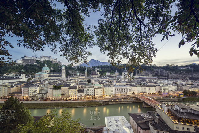 View of the city on Salzach river with Hohensalzburg castle in background, Salzburg