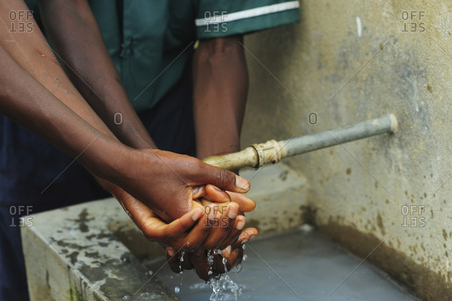 Children wash hands with soap after using sanitary facilities at Thundwe Junior Primary School in Mzimba district