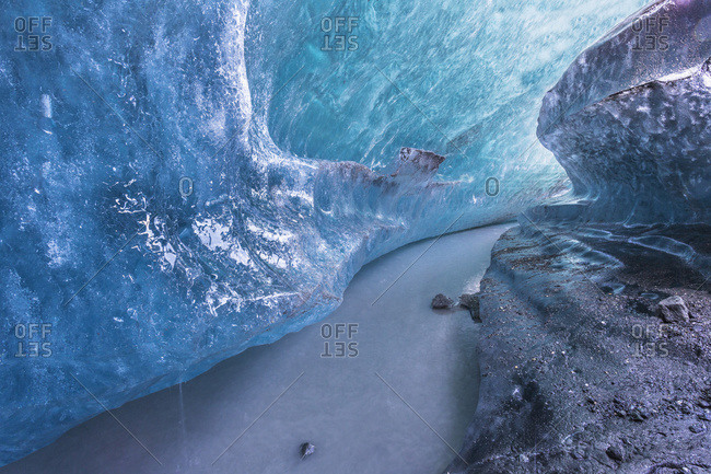 View of an ice tunnel and river flowing inside of the Matunuska Glacier, Alaska, United States of America