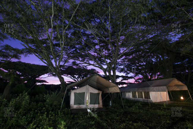Safari camp tents at sunrise on the rim of Ngorongoro Crater, Tanzania