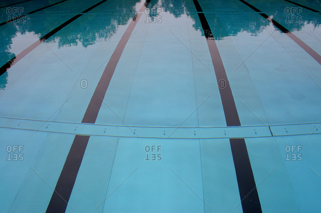 Overhead view of swim lanes painted on bottom of pool
