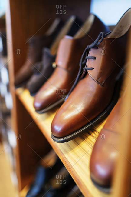 Variety of men\'s dress shoes on a shelf