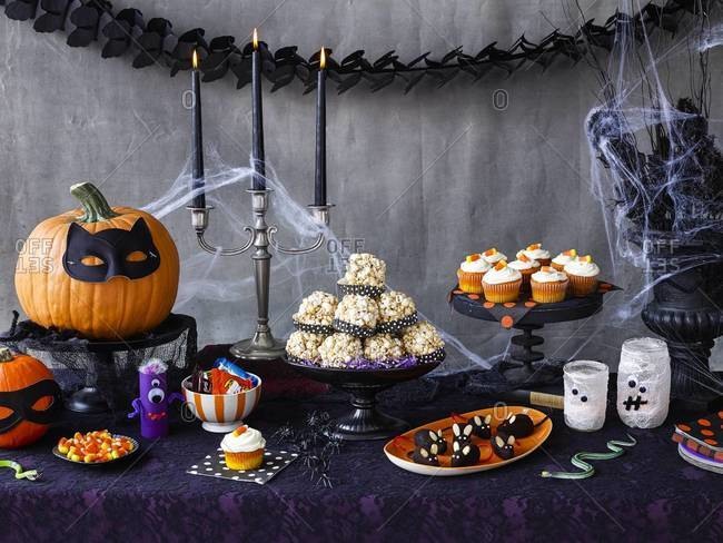 Sweets on a decorated Halloween party table