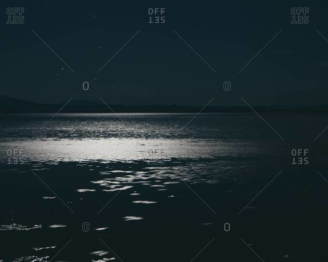 Light reflected on the waters at night in the Bonneville Salt Flats, Utah