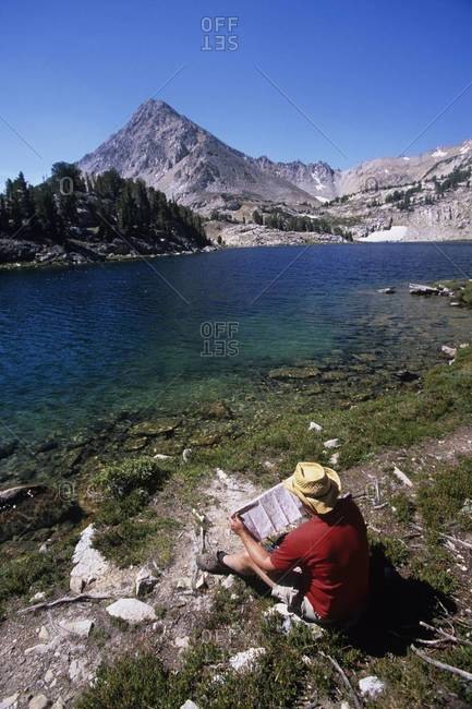 Map reading at Cove Lake in the White Cloud Mountains, Sawtooth National Recreation Area, Idaho