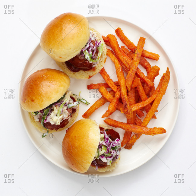 Overhead view of meatball sliders with sweet potato fries
