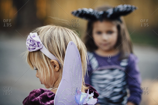 Little girls in Halloween costumes