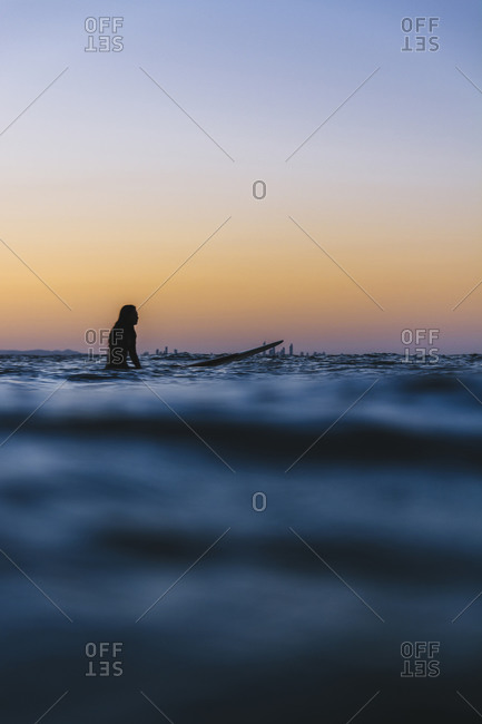 Surfer waiting for the last wave in Australia