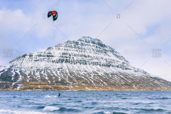 Kite surfing by Eskifjordur, Iceland