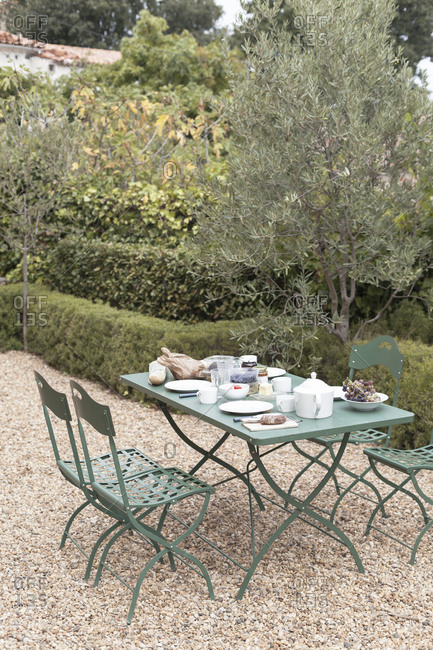 Patio table with breakfast in southern France