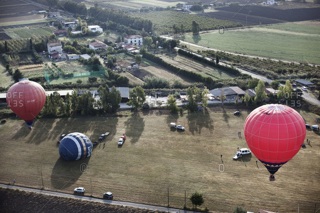 Aerial view of hot air balloons taking off