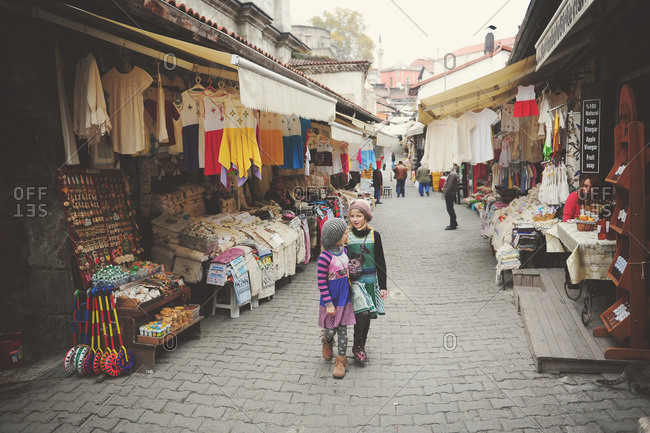 Girls walking through shopping street in Turkey